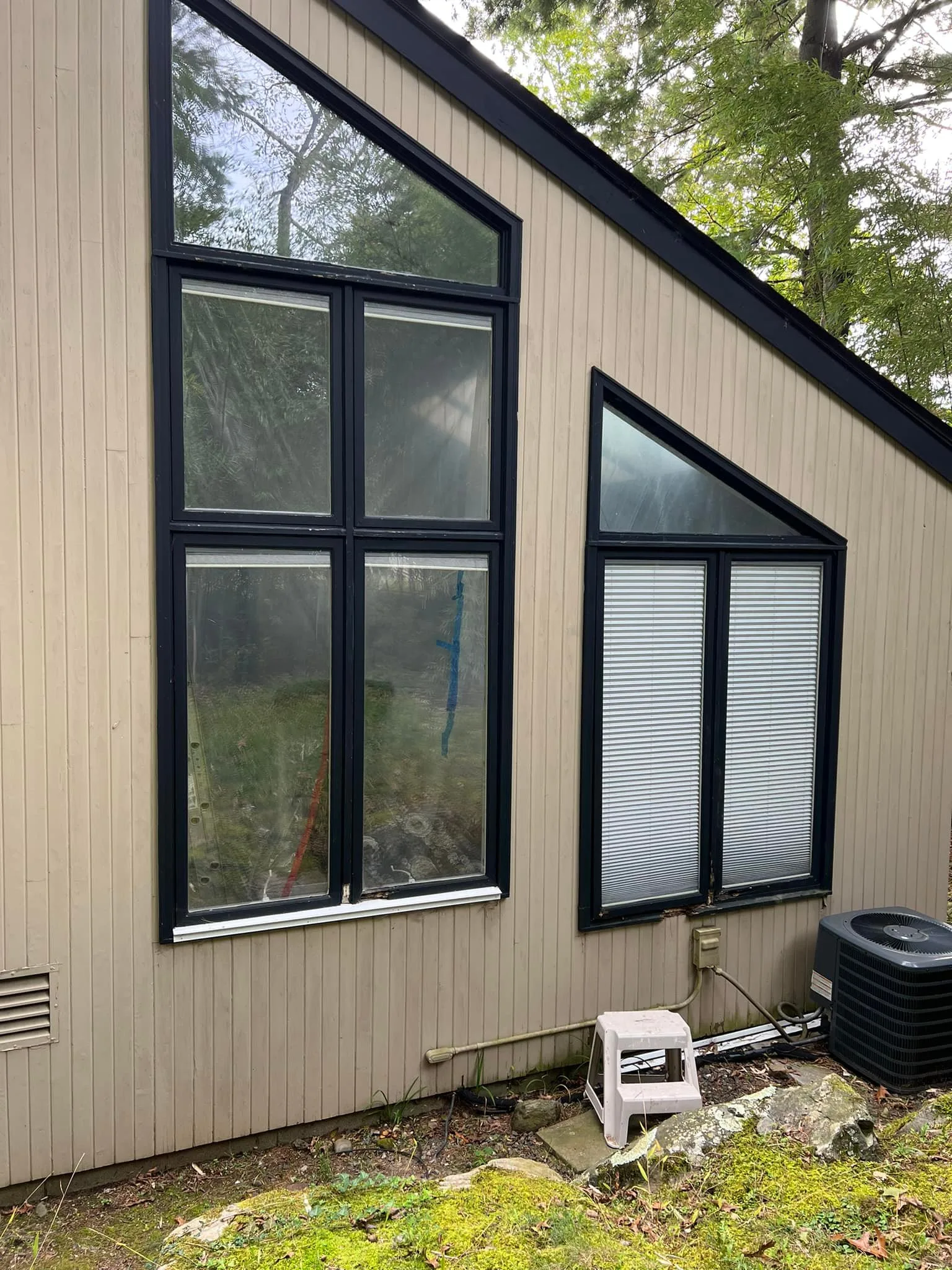 Front view of original windows before Andersen windonws installation.