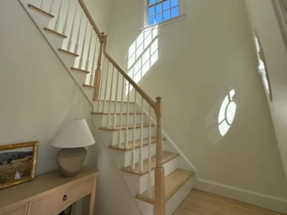 staircase restoration hardwood floor and handrail refinishing.